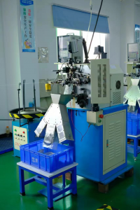 Fully automatic computerized spring compression machine